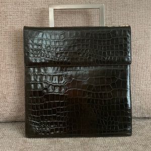 EPISODE embossed genuine leather bag in rich burgundy brown. Silver top handle.